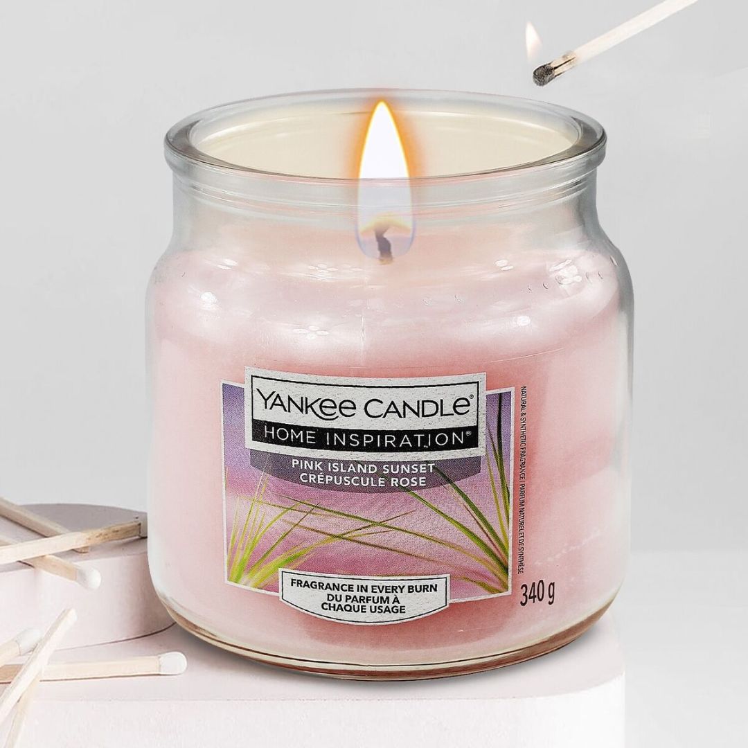 Pink Island Sunset Medium Jar Tropical fruits and citrus of the Yankee Candle® Home Inspiration™ Candle will have you thinking of gentle trade winds and full, pink sunsets stretching the horizon.