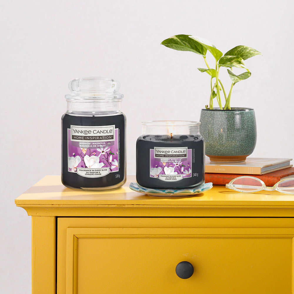 Midnight Magnolia The sweet scent of magnolia flowers fills the air of the night while notes of vanilla and warm moss mix in the moonlight. 