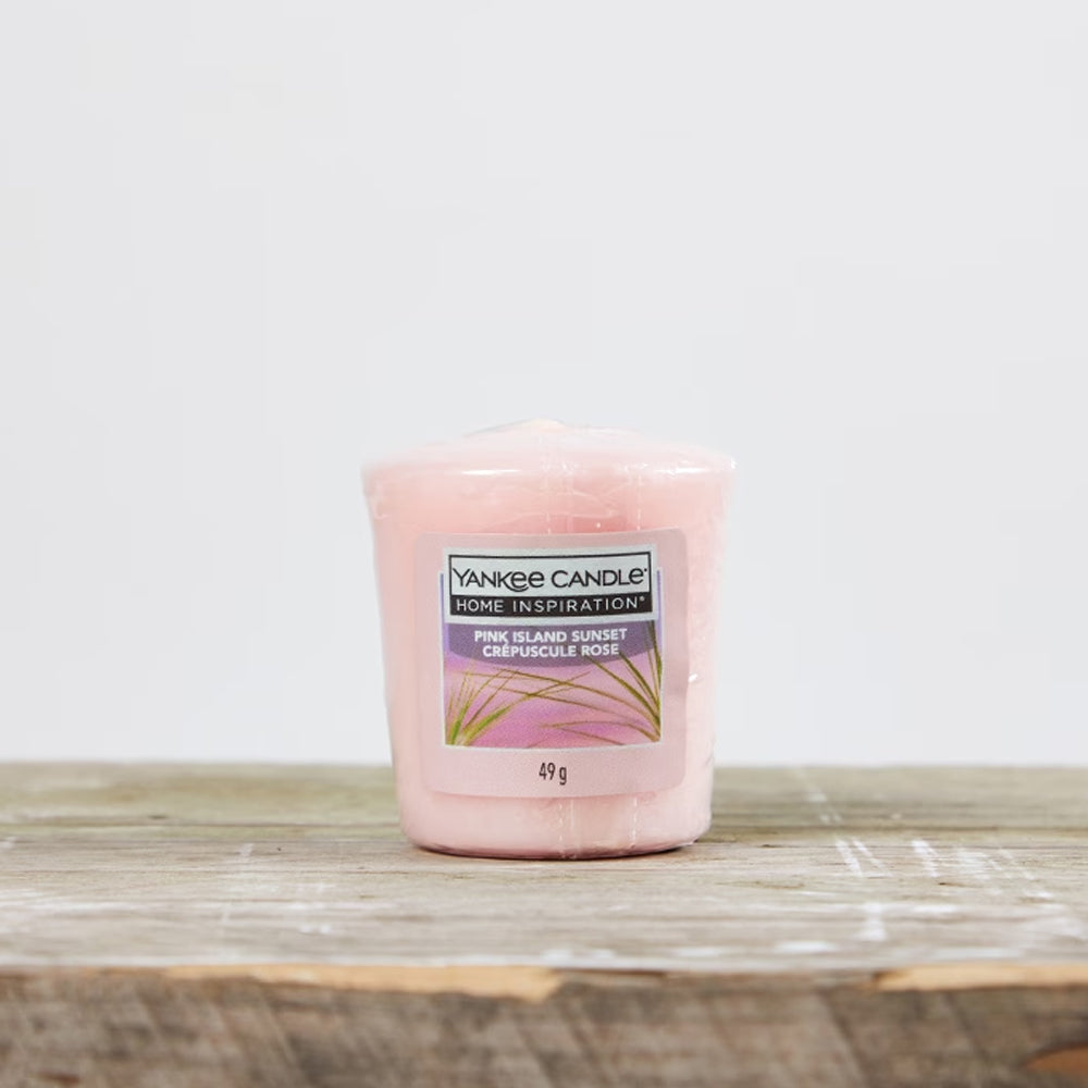 Pink Island Sunset Votive Tropical fruits and citrus of the Yankee Candle® Home Inspiration™ Candle will have you thinking of gentle trade winds and full, pink sunsets stretching the horizon.