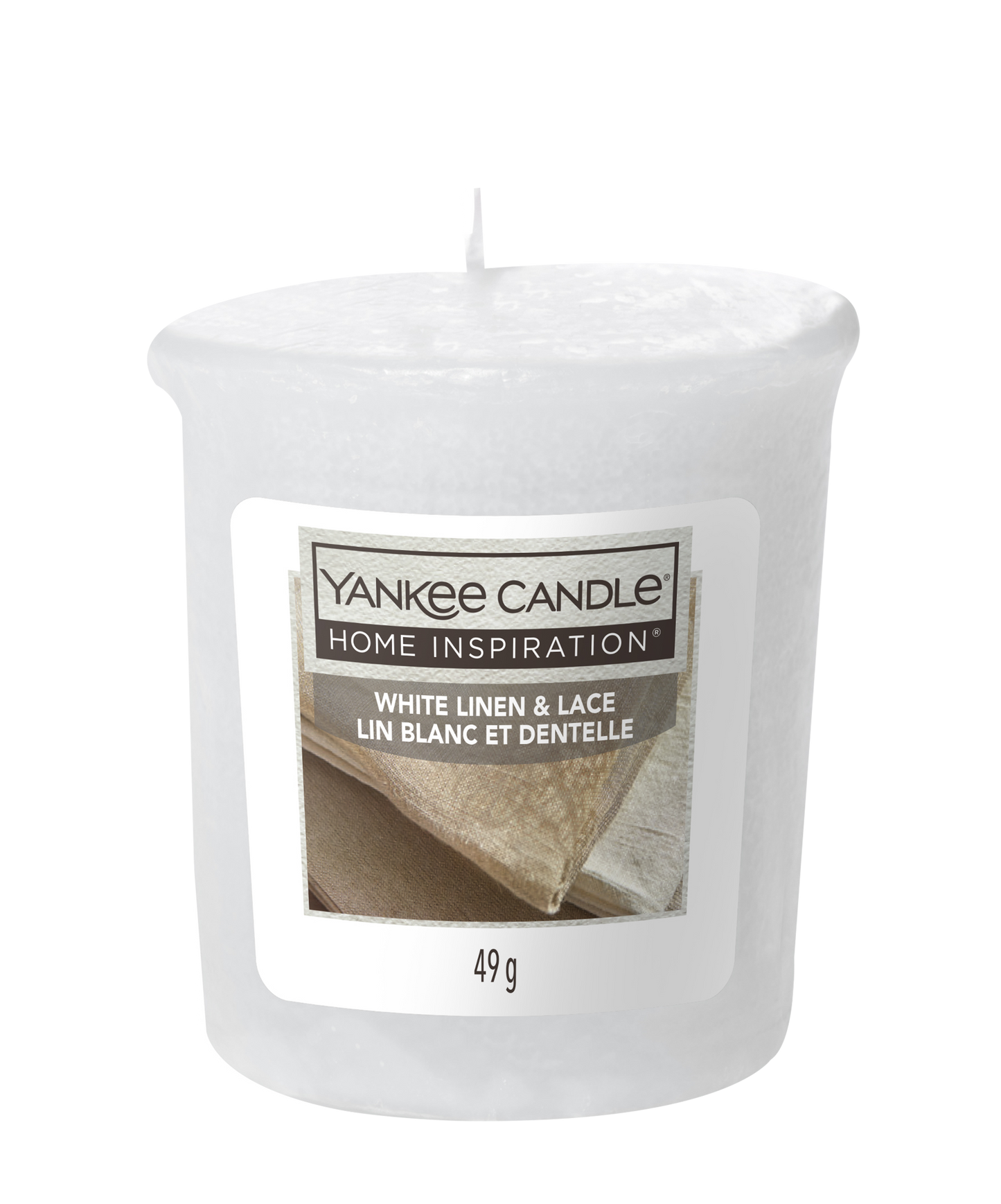 White Linen & Lace Votive This elegant fragrance by Yankee Candle® Home Inspiration® features top notes of ozonic breeze, apple blossom, and raspberry leaf.