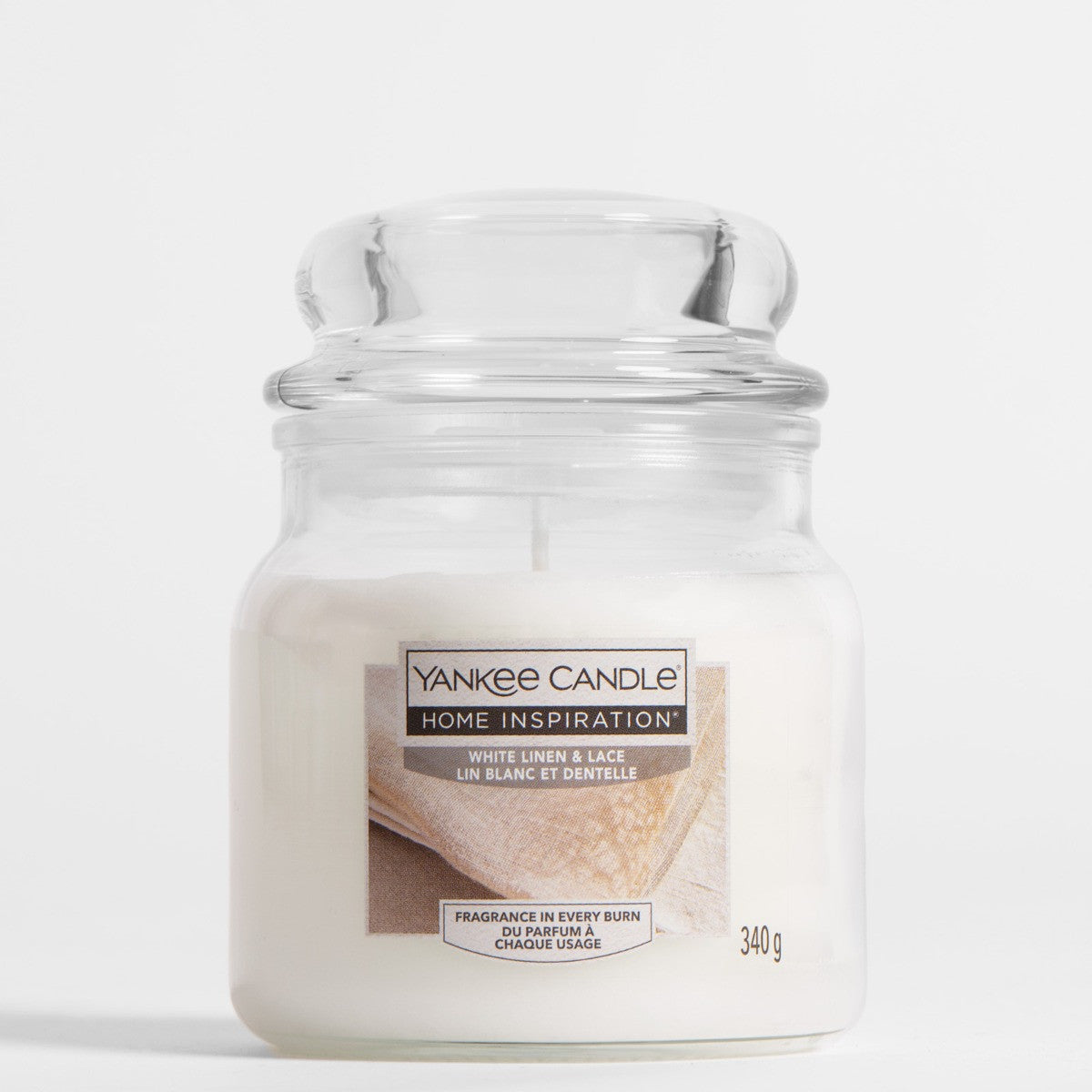 White Linen & Lace Medium Jar This elegant fragrance by Yankee Candle® Home Inspiration® features top notes of ozonic breeze, apple blossom, and raspberry leaf.